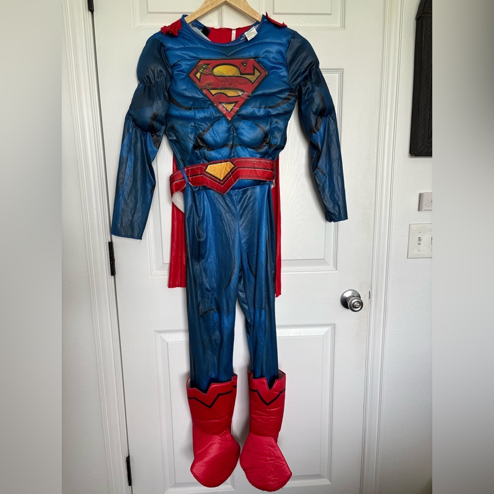 Size large super man Halloween costume with caped muscles, holographic logo